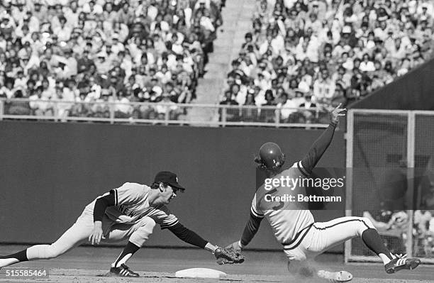 Kansas City, MO: Kansas City Royals' George Brett is tagged out by New York Yankees shortstop Fred Stanley as he attempted to steal second in the...