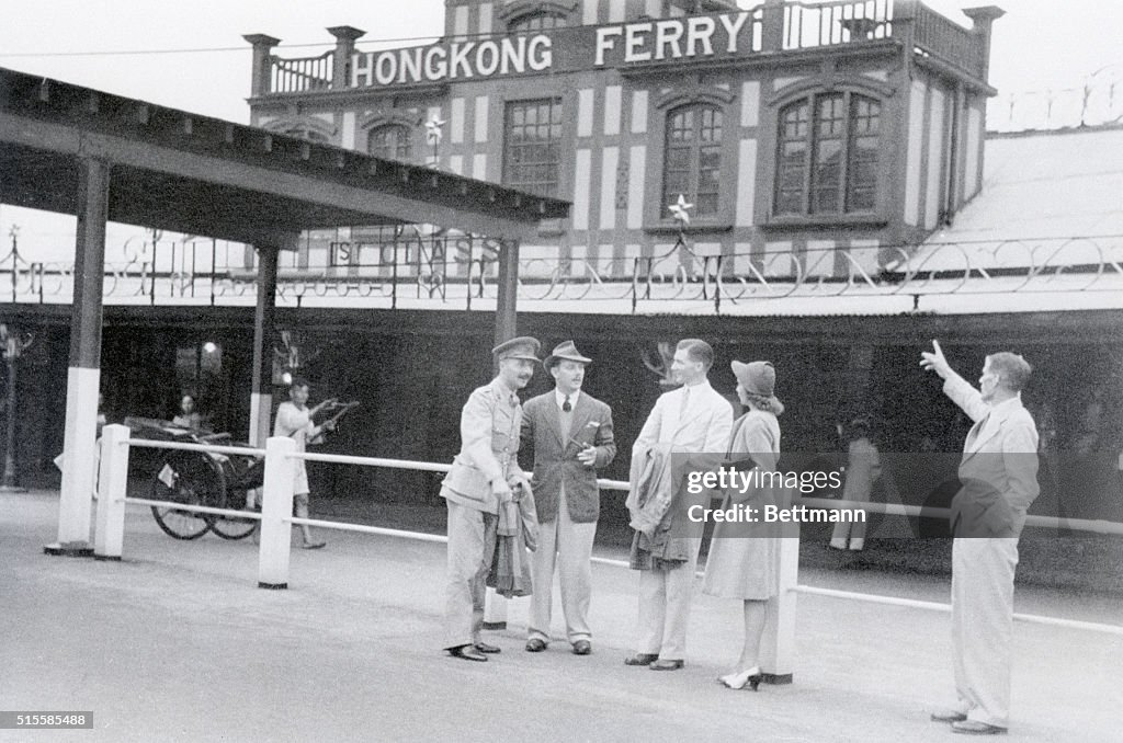 People Standing At Hong Kong Ferry Dock
