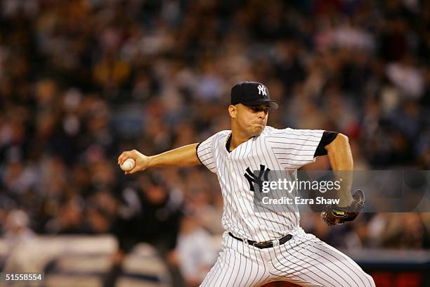 Pitcher Javier Vazquez of the New York Yankees pitches during the Division Series game the Minnesota Twins on September 30, 2004 at Yankee Stadium in...