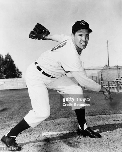 Bob Feller, of the Cleveland Indians, in post-pitch position. Undated photograph.