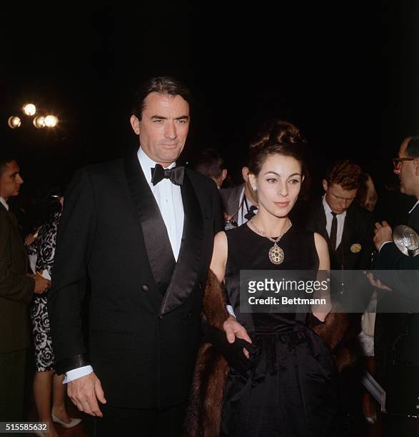 Los Angeles, California: Actor Gregory Peck and his wife at the Academy Awards.