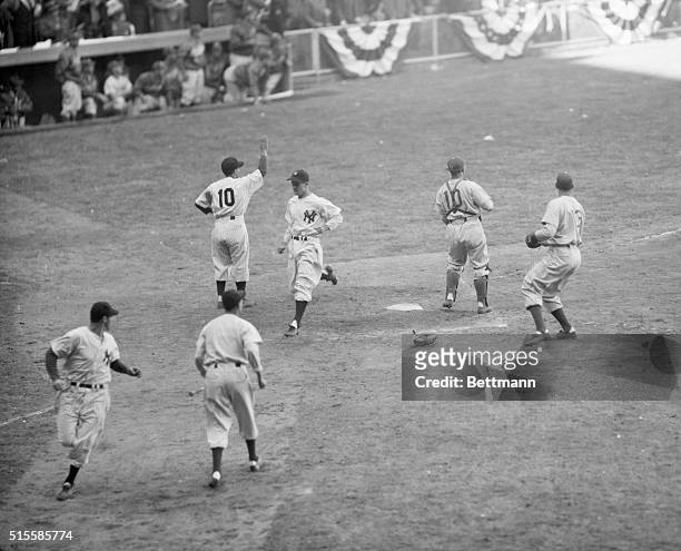 New York City: The Homeplate at Yankee Stadium was busy during the fifth inning of the World Series opener as the Yanks ran wild to score five runs....