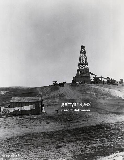 View of a Century Oil Company drilling operation in the Kern River District of California, circa 1898.