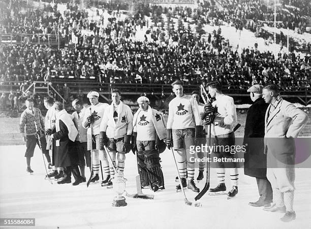 St. Moritz, Switzerland- Photo shows the first-place Canadian hockey team with the 1928 Olympic Cup. The U.S. Won second place.