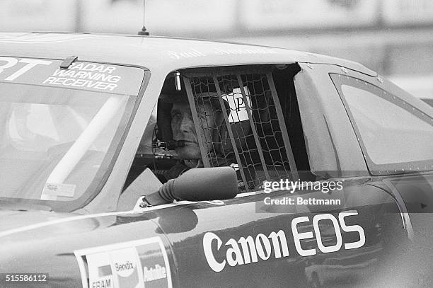 East Rutherford, New Jersey- Paul Newman concentrates as he waits for the start of qualifying round for his Trans-Am racer at the Meadowlands.