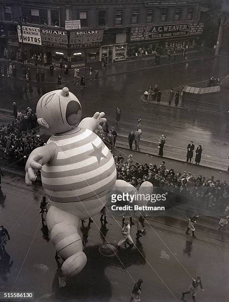 New York, New York- This giant 'Colicky Kid' balloon was one of the features in the annual Macy's Thanksgiving Day Parade which paraded down...