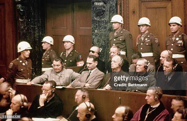The defendants at the Nuremberg Nazi trials. Pictured in the front row are: Hermann Goering, Rudolf Hess, Joachim Von Ribbentrop, Wilhelm Keitel and...