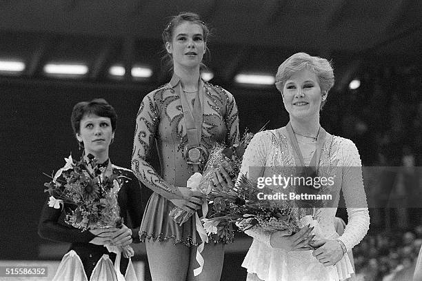 Sarajevo, Yugoslavia- Katarina Witt of East Germany , Rosalynn Sumners of the U.S.A. And Kira Ivanova of the U.S.S.R. Stand on the podium after...