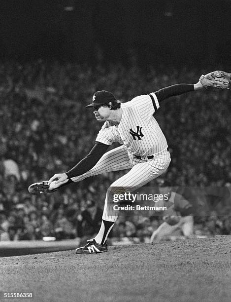 New York, NY: Goose Gossage, relief pitcher for the New York Yankees, fires a high hard one at Dodger batters during the 9th inning of the second...