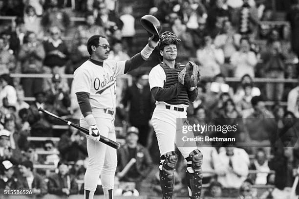 Chicago, IL: Super star Reggie Jackson acknowledges a standing ovation as he comes to bat for the last time as a major leaguer. White Sox catcher...