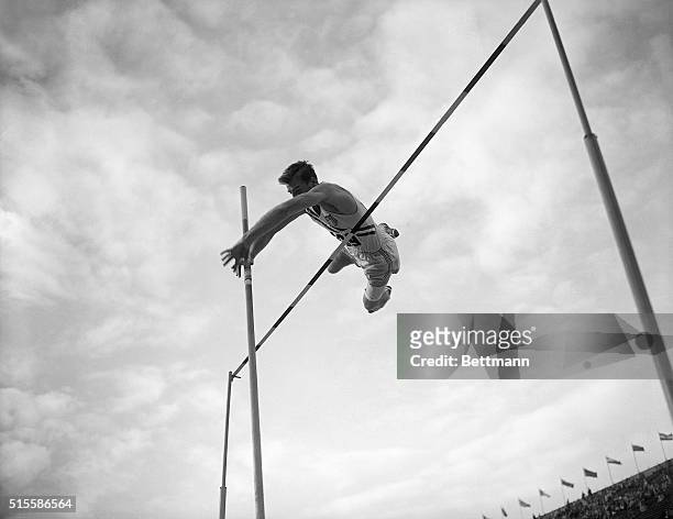 American decathlete Bob Mathias competes in the high jump competition during the 1952 Summer Olympic Games at Helsinki.