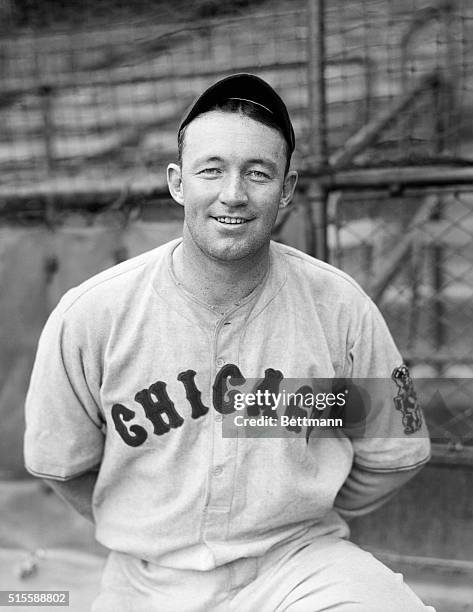 Photo shows Frankie Frsich fielding a ball low to the ground.