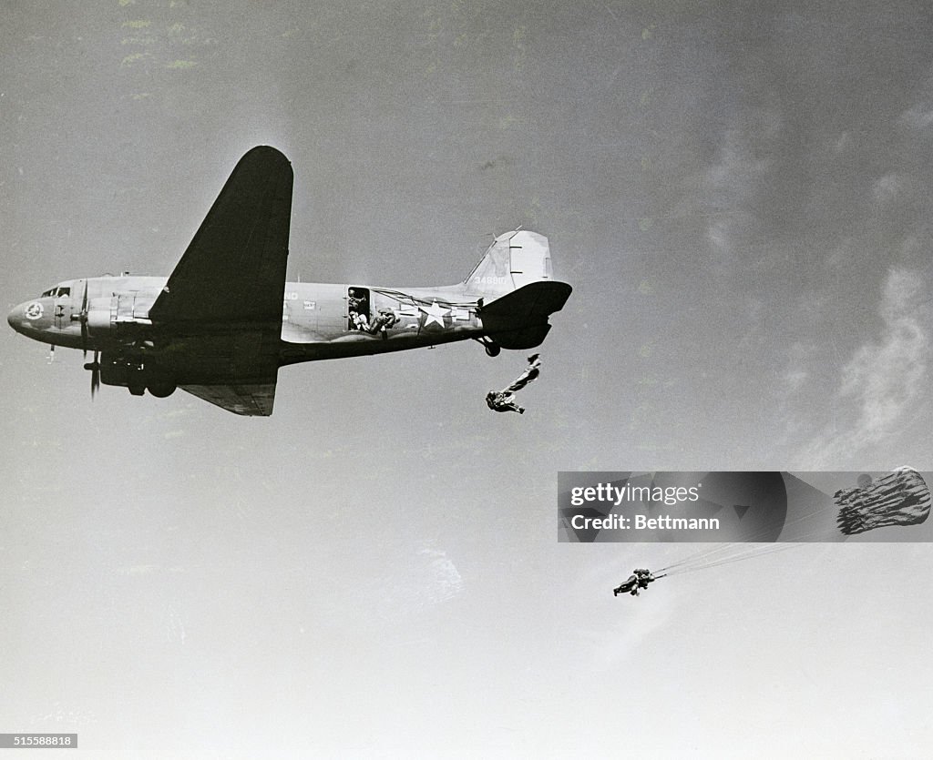 Paratroopers Jumping from Airplane