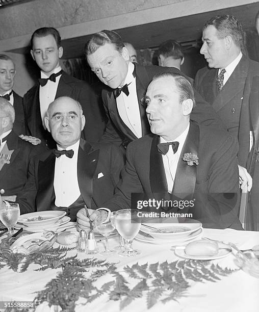 New York, NY- Governor Herbert H. Lehman, James Cagney, and Pat O'Brien are pictured here , attending the "Fighting 69th" dinner tendered by Warners.