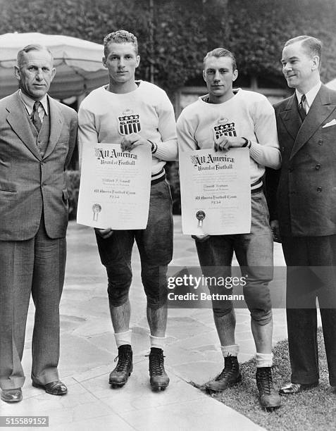 Don Hutson, and Dixie Howell, members of the Alabama Rose Bowl Football Team, were awarded All-America certificates as part of the cereonies at the...