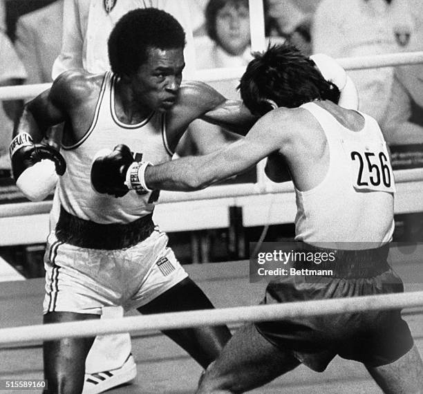 Montral, Canada- USA's light welterweight "Sugar" Ray Leonard Palmer Park, MD, connects with a left to his opponent, Poland's Kazimier Szczerba,...