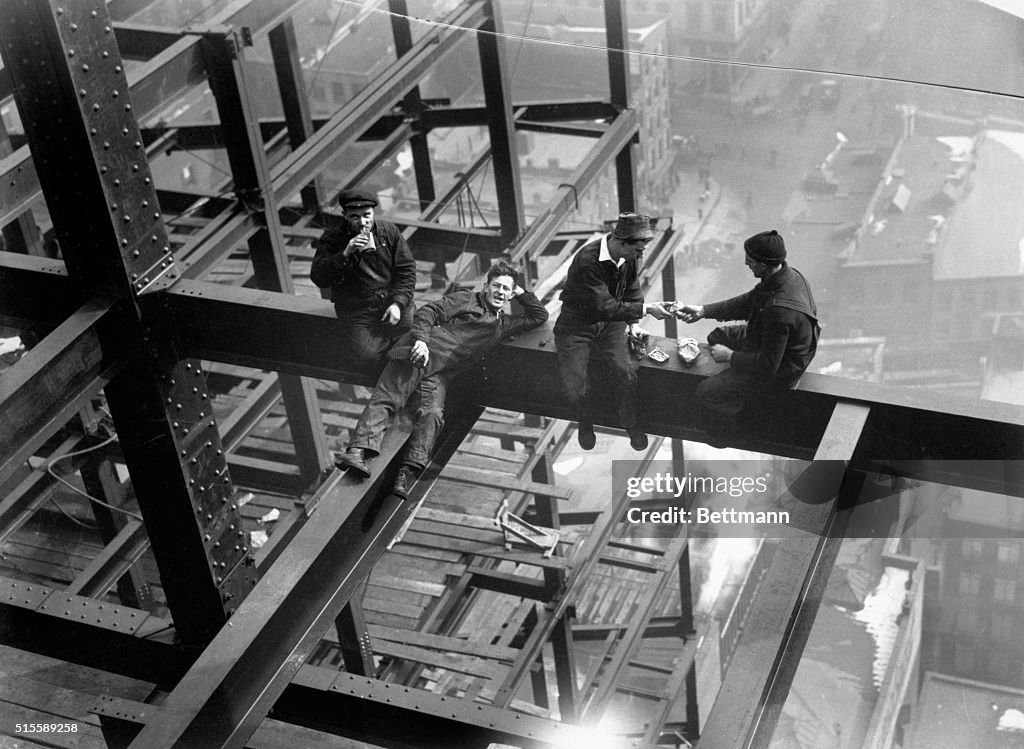 Workers Eating Lunch Atop Beam
