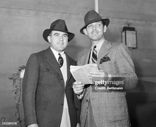 Hal Roach, , and Clark Gable, are pictured as they attended the races at Santa Anita race track.