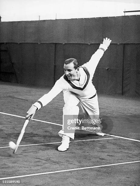 Bournemouth, England- Fred Perry, the Wimbledon Champion, fresh from his Australian and Amerian tours, defeated J.D. Morris 6-3, 6-1, 6-3 in the...
