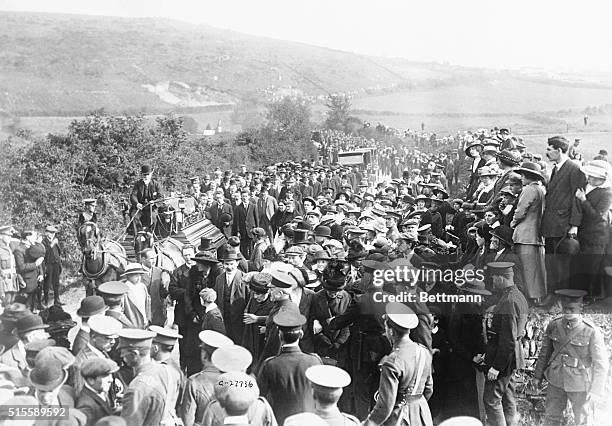Lusitania Disaster. Scene showing the funeral procession on its way to the Queenstown churchyard to bury victims of the disaster.