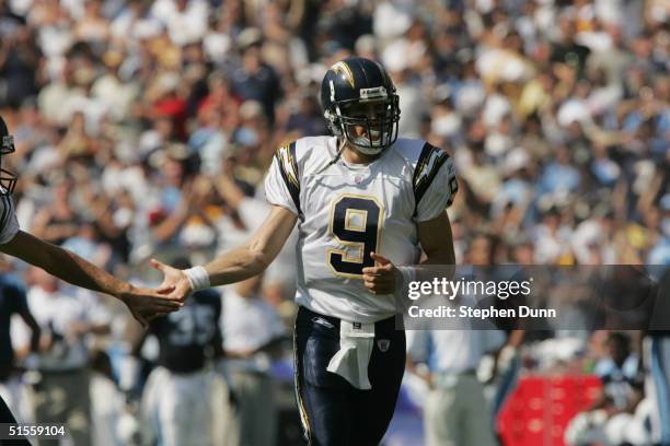 Quarterback Drew Brees of the San Diego Chargers celebrates during the game with the Tennessee Titans on October 3, 2004 at Qualcomm Stadium in San...