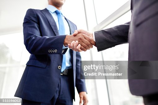 People shaking hands People shaking hands