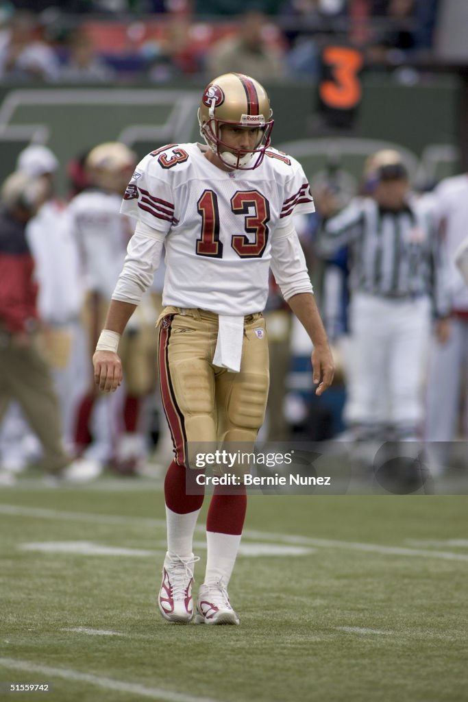 QB Tim Rattay of the San Francisco 49ers walks with head down in the ...