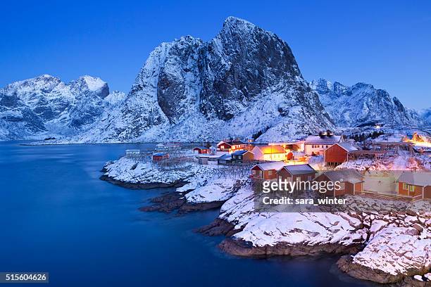 Norwegian fisherman's cabins on the Lofoten at dawn in winter