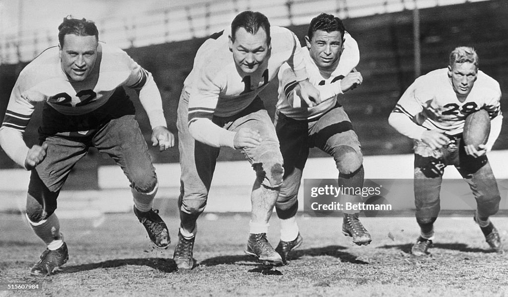 Football Players in Tackle Positions