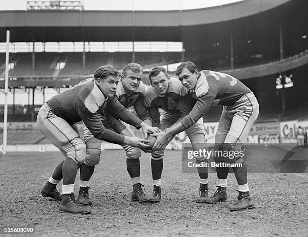 Photo shows the Cleveland Rams with the starting back field left to right as Corby Davis, Rudolph Mucha, Johnny Drake, and Parker Hall.