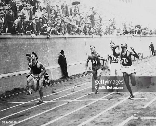 Near blanket finish in Olympic tryouts...Martin Glickman, of Brooklyn, second left, as he nosed out Ben Johnson of New York in a thrilling finish at...