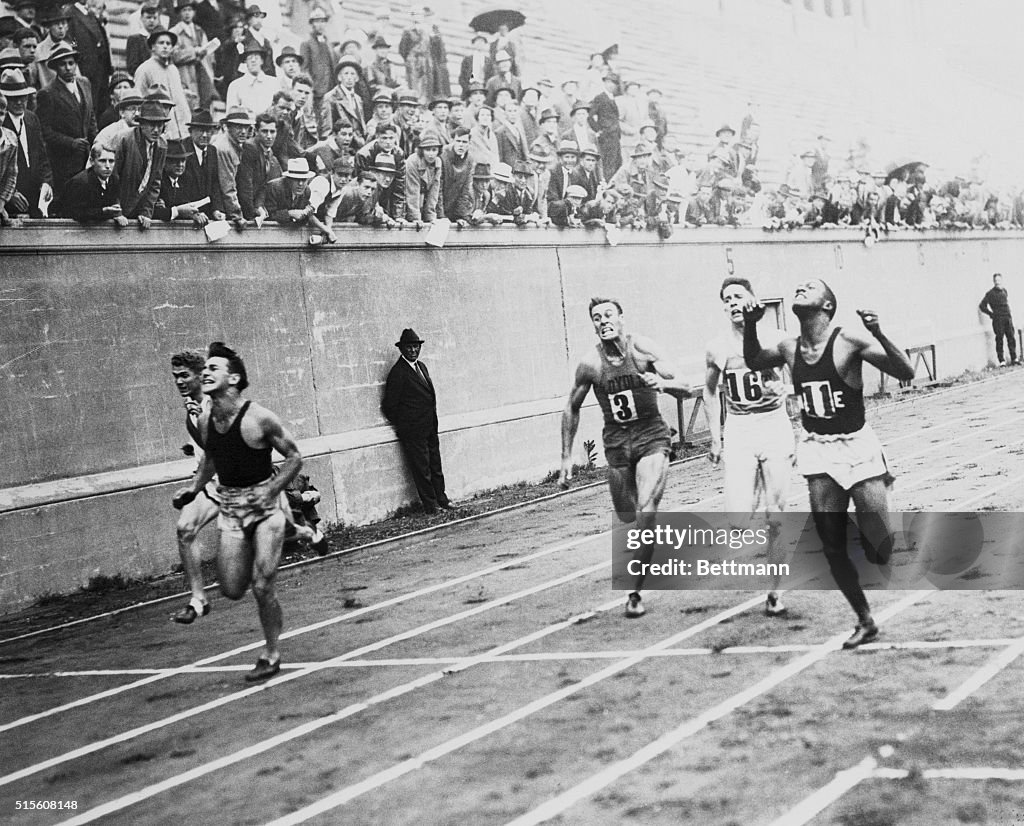 Runners Crossing Finish Line