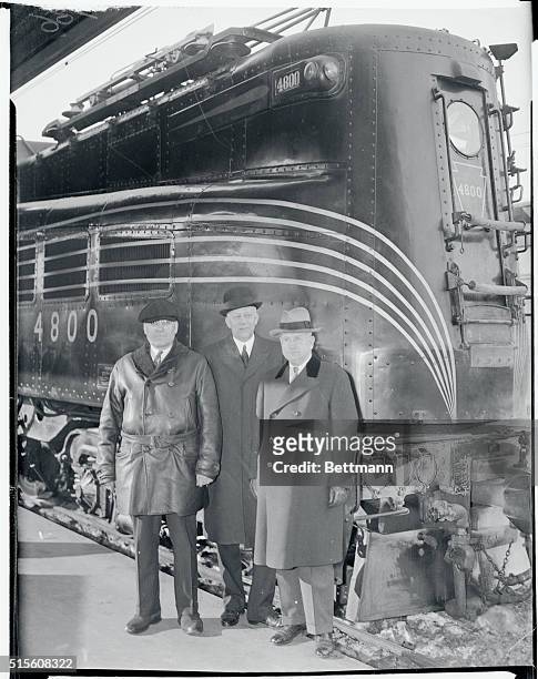 Road Foreman Claud G. Wilcox, M. W. Clement, Vice President of the Pennsylvania Railroad, , and Secretary of the Interior Harold Ickes, , pictured...