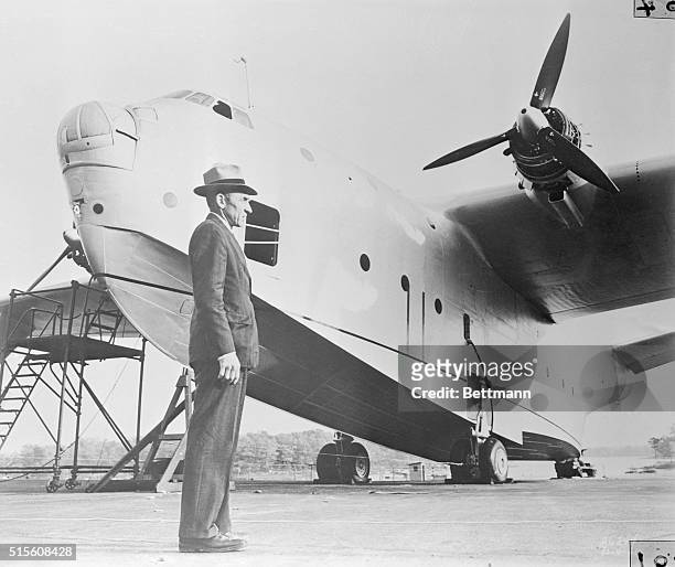 Veteran test pilot William Ebel, Vice-President in charge of engineering at the Glenn L. Martin Co., in Baltimore, shown about to climb aboard the...
