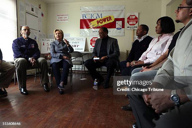 Democratic presidential candidate Hillary Clinton meets Monday, March 14 with U.S. Rep. Bobby Rush, left, and Jethro Head, right, International Vice...