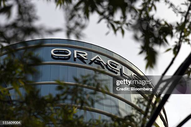 Signage is displayed on a building at the Oracle Corp. Headquarters campus in Redwood City, California, U.S., on Monday, March 14, 2016. Oracle Corp....