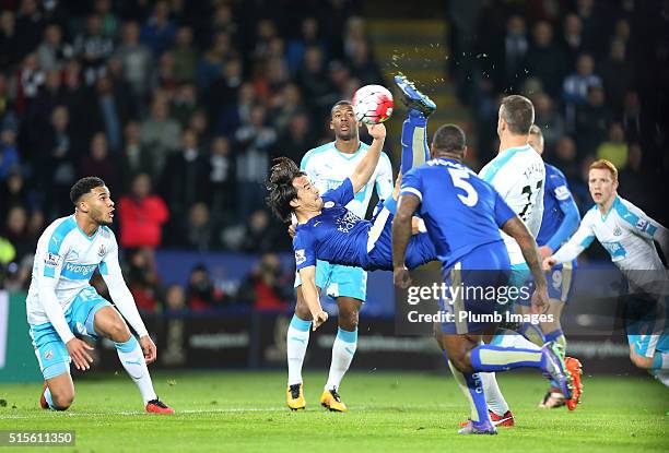 Shinji Okazaki of Leicester City scores with a bicycle kick to make it 1-0 during the Barclays Premier League match between Leicester City and...