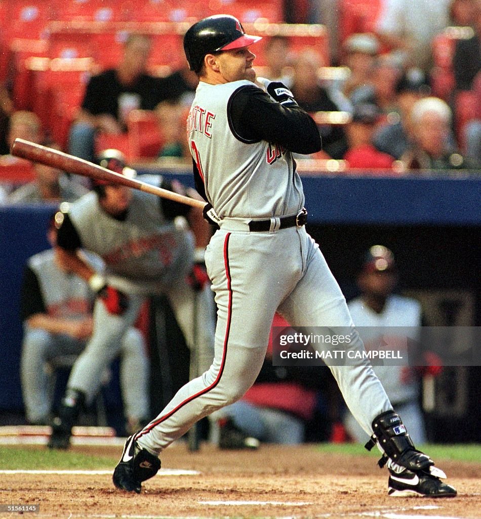 Cincinnati Reds right fielder Dante Bichette hits