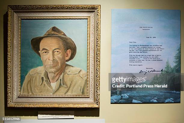 Painting created by President Dwight D. Eisenhower of his Rangeley area fishing guide Don Cameron, and a letter the President wrote to Cameron, hang...