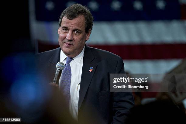 Chris Christie, governor of New Jersey and former 2016 Republican presidential candidate, pauses while speaking during a town hall event with Donald...