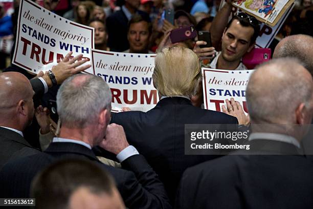 Donald Trump, president and chief executive of Trump Organization Inc. And 2016 Republican presidential candidate, greets attendees after speaking...