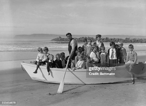 Coronado Beach, CAL.: Babe Ruth Swamped With And By Young Admirers When He Visits California. While his team mates in the east are rustling up...