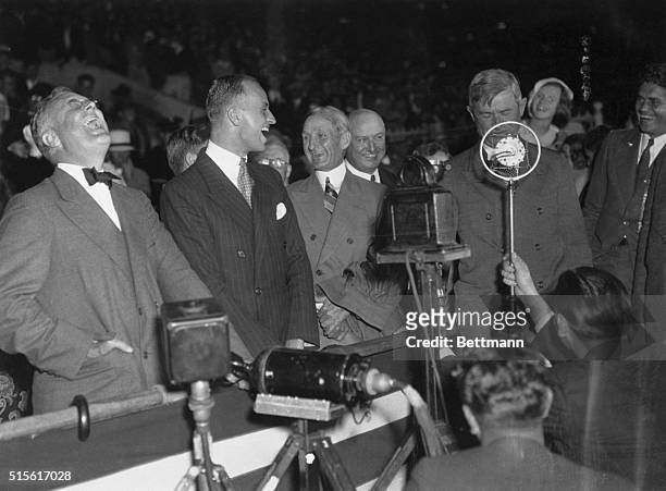Democratic rally at Olympic Stadium Franklin D.Roosevelt, his son James, Senator William McAdoo, Jim Farley, and Will Rogers.