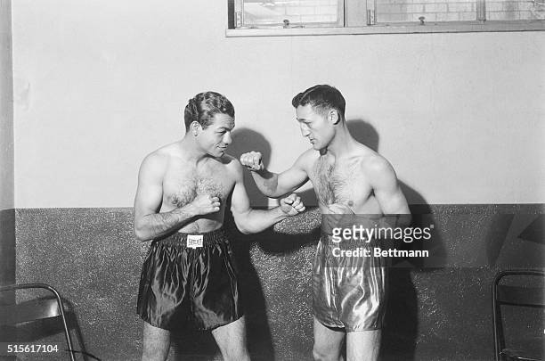 Billy Petrolle and Tony Canzoneri square off jokingly before their featherweight championship fight.