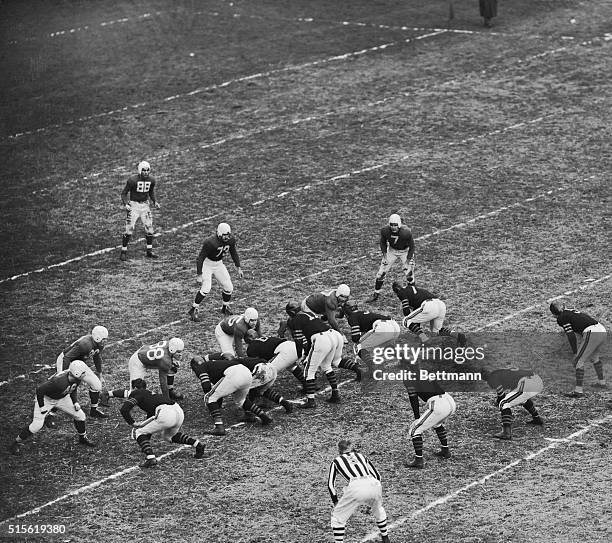Here the Bears brush up on their famed "T" formation, which failed to faze the Giants throughout most of their September 7th exhibition game, when...