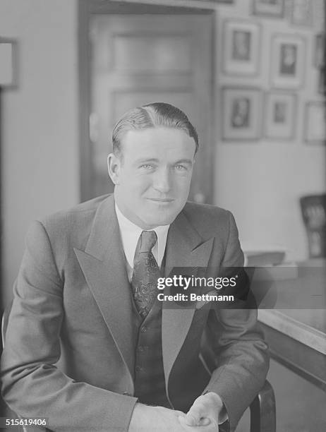 Joe Cronin, Washington shortstop named to succeed the veteran Walter Johnson as Manager of the Nationals. Photo shows Joe with a great bit smile just...