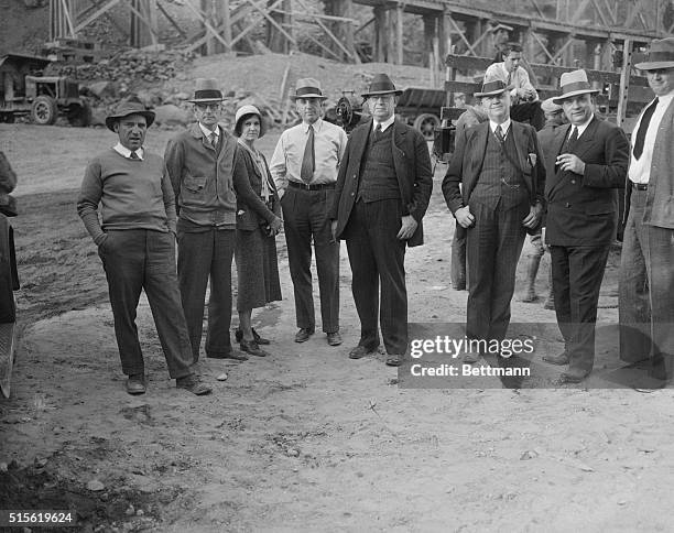 Six Companies, Inc. Officials at dam site- Left to right, Charles Shea; Walker K.Young, U.S. Govt. Engineer at Dam Site; Mrs.W.K.Young; Allan...