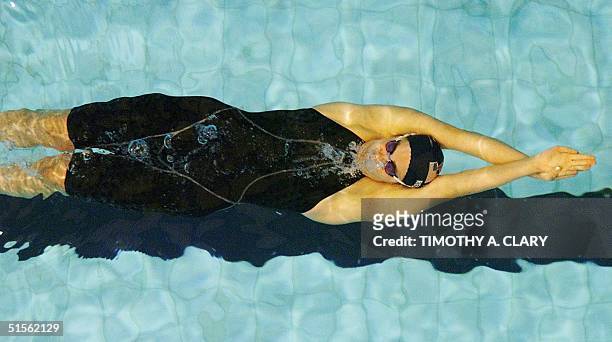 Jamie Reid pushes off at the start of the Women's 200m backstroke preliminaries at the 2000 United States Olympic Swim Trials at the Indiana...