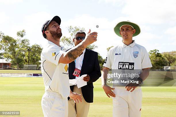 Bushrangers captain Matthew Wade and Blues captain Nic Maddinson conduct the coin toss with match referee David Talalla during day one of the...