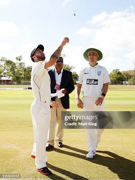 Bushrangers captain Matthew Wade and Blues captain Nic Maddinson conduct the coin toss with match referee David Talalla during day one of the...